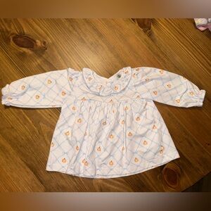 Adorable White and Blue Baby Dress with Orange Accents